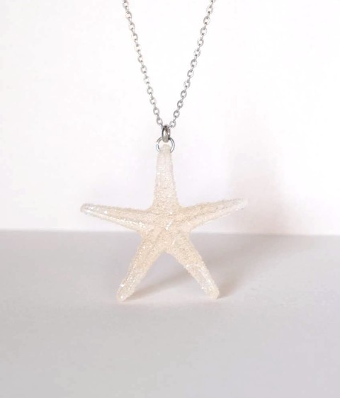 Collana stella marina in resina, color sabbia dorata